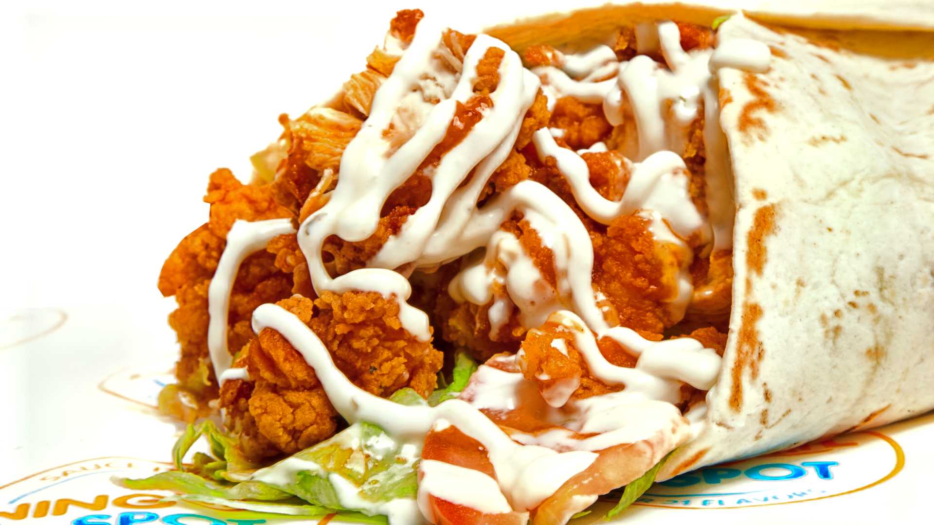 Boneless buffalo tenders with lettuce, tomatoes & ranch dressing. Boneless buffalo tenders with lettuce, tomatoes & ranch dressing.